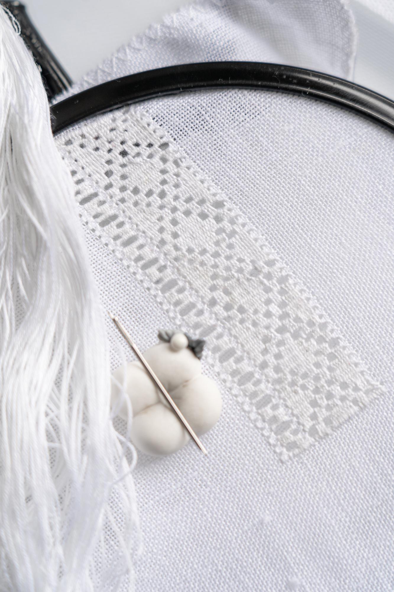 close-up embroidered detail on linen